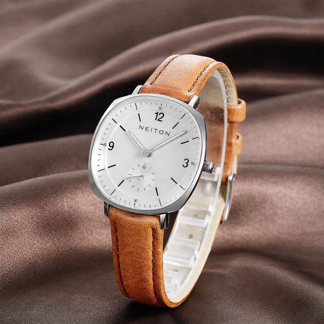 A women's quartz watch standing on the tabletop.