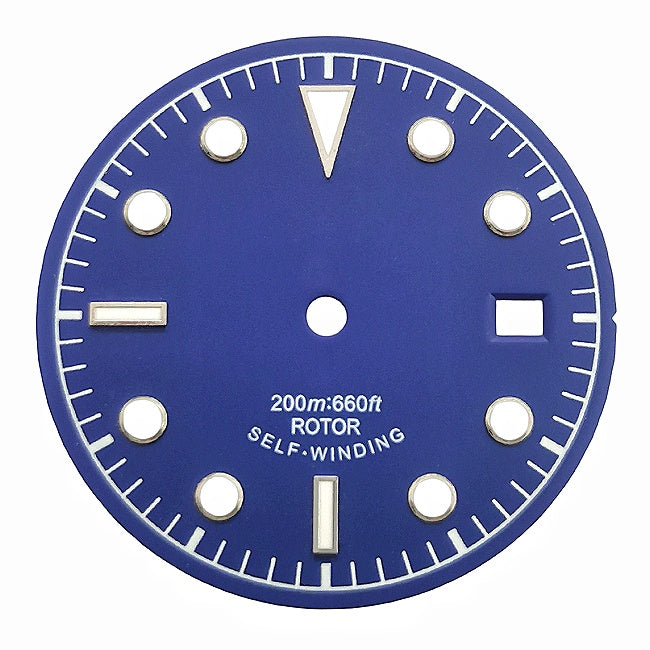 Blue and white vintage-style diving watch dial with baton and dot markers.