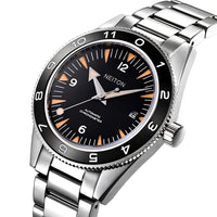 Close-up view of the NEITON black GMT watch