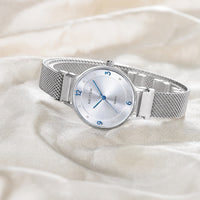 Flat-lay image of a custom women's quartz watch