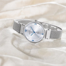Flat-lay image of a custom women's quartz watch