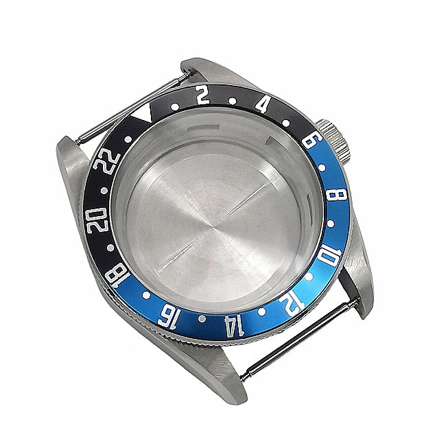 GMT-style case with a blue-black bezel