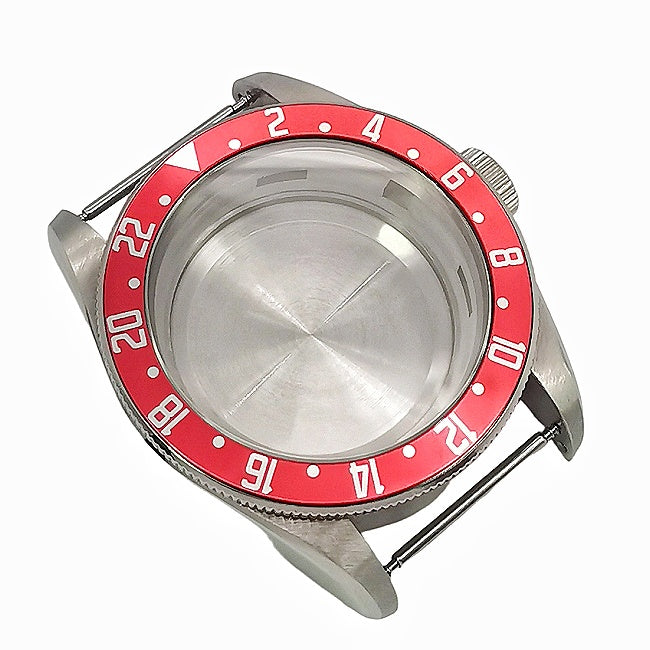 GMT-style case with a red bezel