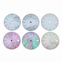 Six pearlescent mother-of-pearl dials