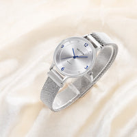 View of the right side of a custom women's quartz watch.